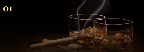 Cigar and glasses in a dark lounge setting
